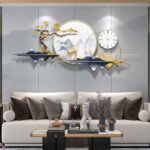 ⁦ساعة حائط مع ديكور جداري⁩ - الصورة ⁦3⁩