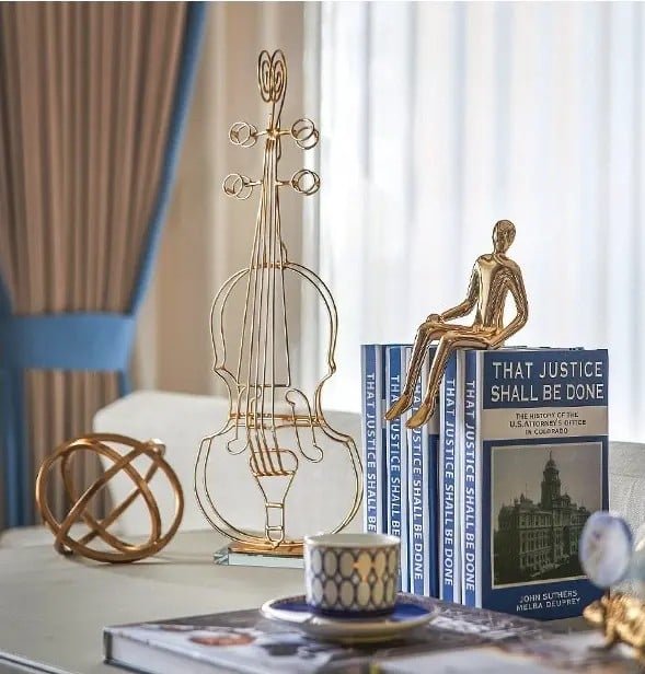 oSBuBXArvFLgUs8e5m8CeNcMu96wu6gwtmEGeWjx_0edb2b45-ae9f-4917-a1ec-dfa192aaac3d.jpg تحفه ديكوريه بتصميم الجيتار - الصورة 1